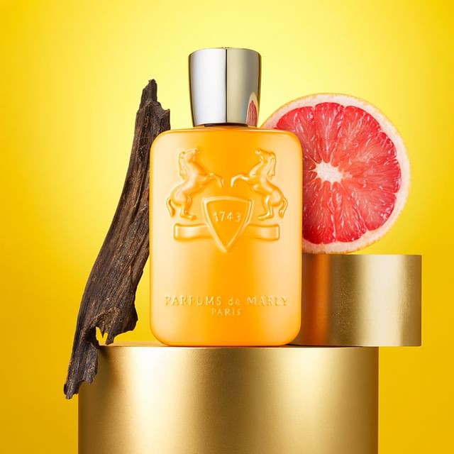 Photo by LXS - Luxury Cosmetics on March 08, 2024. May be an image of fragrance, perfume, grapefruit and text.